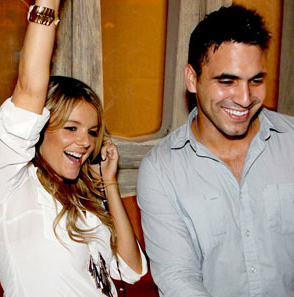 Picture 173 Former bachelorette Ali Fedotowsky appears happy being engaged to Roberto Martinez, but she's postponed the wedding twice. Photo courtesy of E! News.