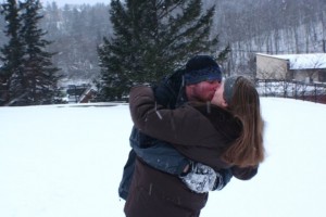 kissing in the snow My fiance and I were playing in the snow when a friend of ours who is a photography major happened to be taking shots that day. We didn't know she took this picture until later. Photo by Nikki LaFaille