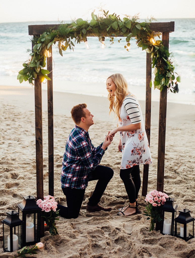 beach proposal love flowers