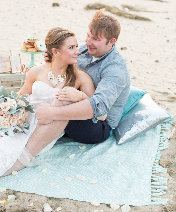 beach proposal happy couple