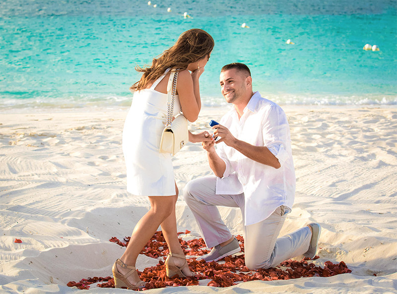beach proposal love beautiful couple
