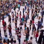 Men on Stilts + Balloons + Huge Flashmob = Awesome Proposal