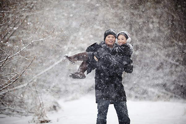 He Surprised Her with a Proposal at Work and a Snowy Engagement Session